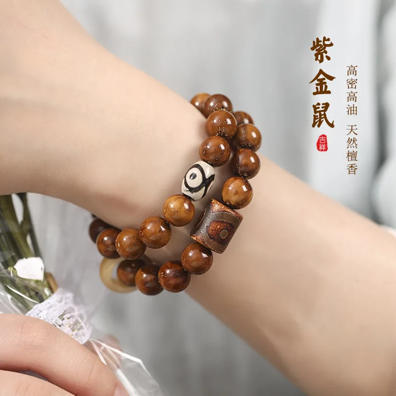 Wealth-enhancing purple gold mouse bead bracelet featuring light-colored beads bodhi seeds and a wish-fulfilling ring a hand
