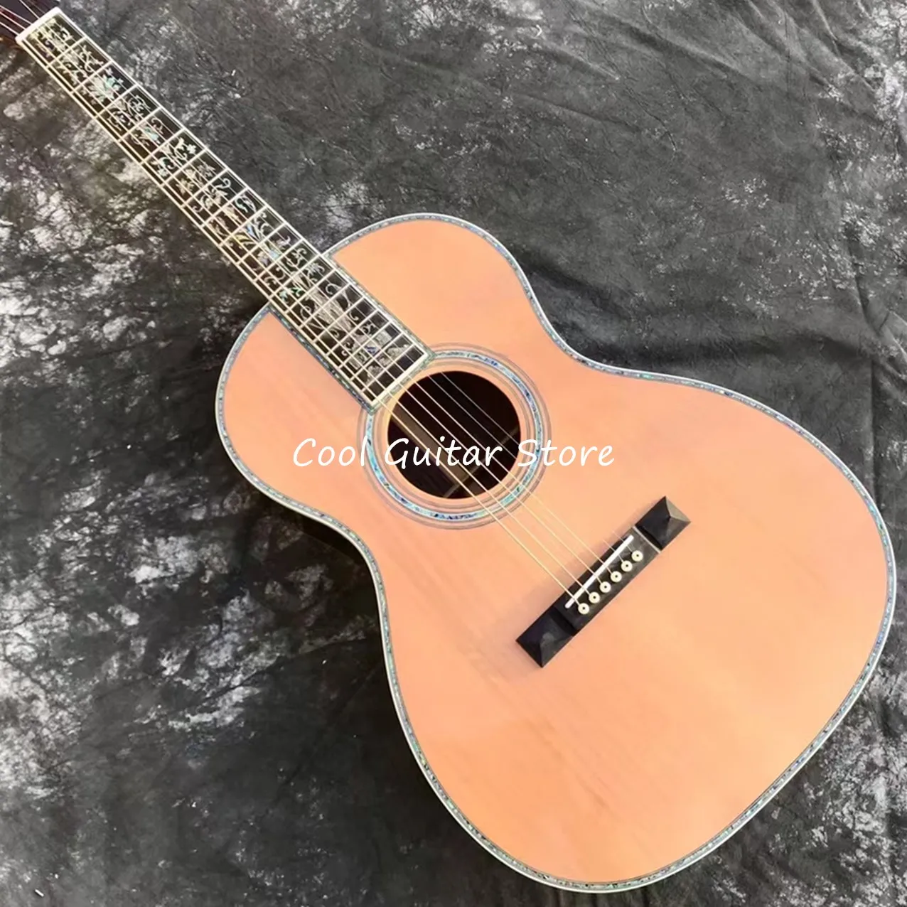 

Solid Cedar Top OM Style Acoustic Guitar,Fishbone Binding,Classical Shape Headstock,Ebony Fretboard,39 Inches,Free Shipping