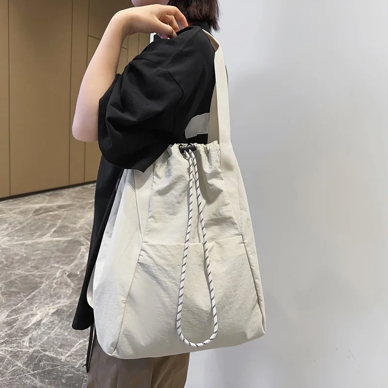 New Fashion Drawstring Bundle Casual Backpack Women's Outdoor Sports Backpack Men's Lightweight Nylon Cloth Shoulder Bag Tide