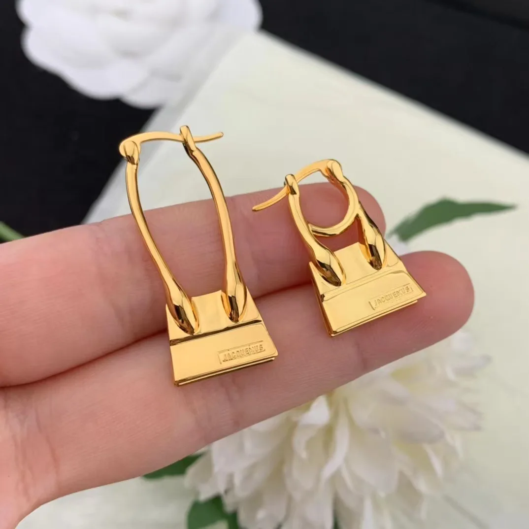 

Women Brass Les Creoles Chiquito Noeud Asymmetrical Chiquito Noeud Earrings.