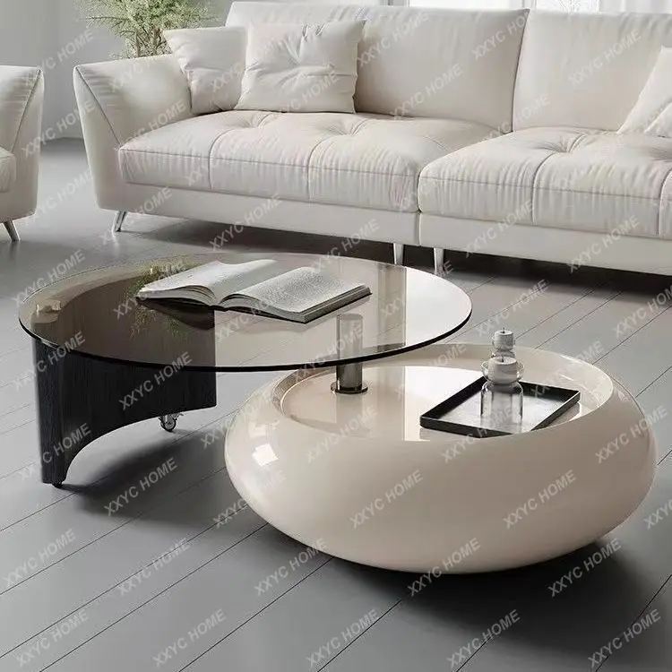 Rotating cream wind coffee table small apartment living room light luxury high-end sense round tempered glass coffee table