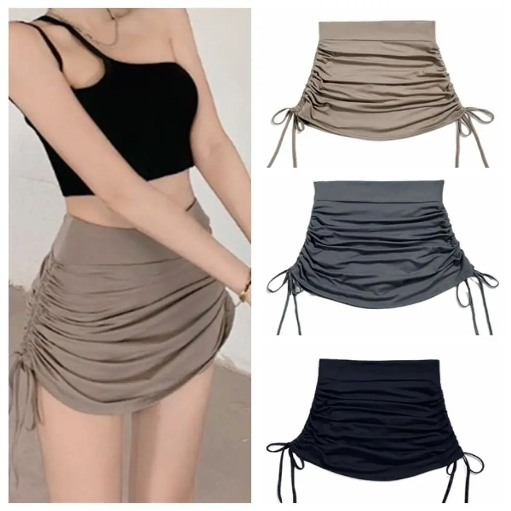 

Короткая плиссированная мини-юбка А-силуэта с завязками, облегающая, с защитными шортами, высокая талия, в корейском стиле, на шнуровке, летняя