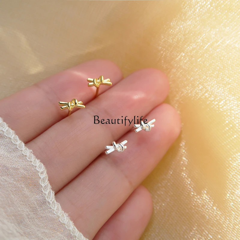 

Mini Invisible Simple Design Sense Tie Bow Female Ear Bone