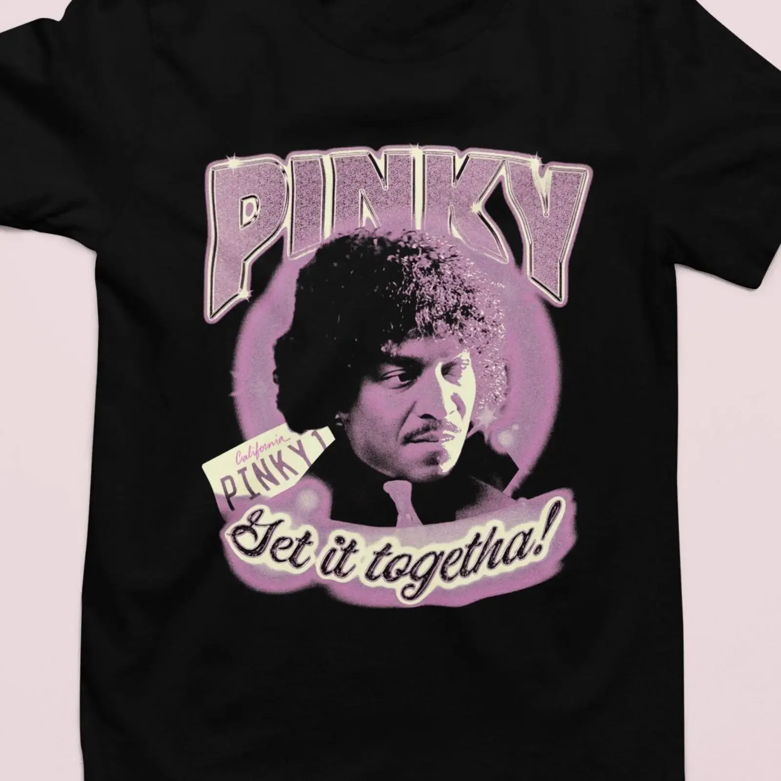 May include Black t shirt with a pink and white graphic of man large afro the text Pinky Get it togetha vintage Washed