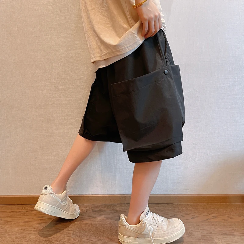 Plus Size Summer Streetwear coreano Hip Hop Big Pocket Cargo Shorts uomo Harajuku Casual basket Baggy Shorts pantaloni Oversize