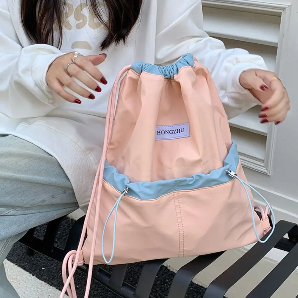 

Korean Style Drawstring Backpacks Large Capacity Contrast Color Light Soft Nylon Bag Niche Design Solid Color Shoulder Bag