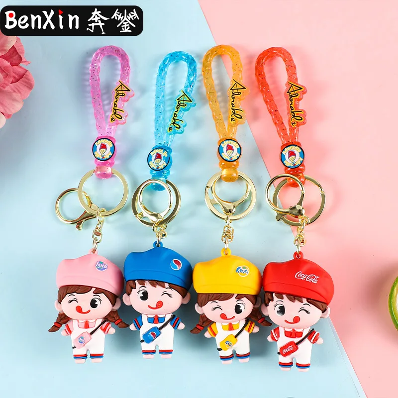 

Miniso mini Cola boy and girl doll key chains, car pendants, couple bag pendants, key chains, bag pendants