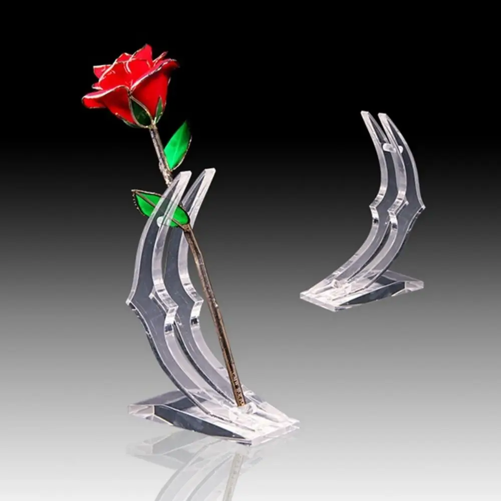 

Кронштейн для искусственной розы с прозрачным основанием. Износостойкий держатель для розы с плоским дном и одним стержнем. Нескользящий, легко чистится.