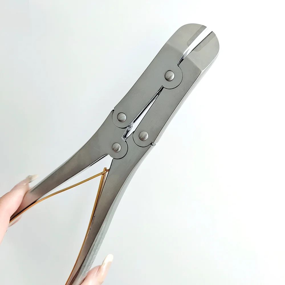 กรรไกรตัดลวดเหล็กคิร์ชเนอร์แบบมีด้ามจับทองคำ พร้อมเข็มเหล็กแบบสองข้อต่อ