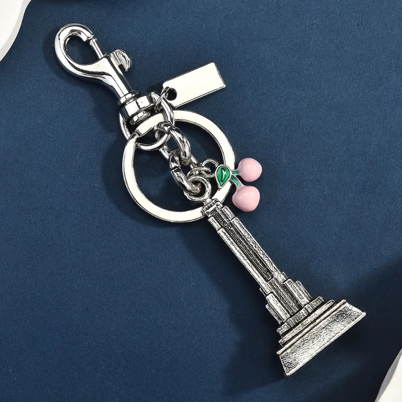 Nuova borsa portachiavi con torre da costruzione di fiori di ciliegio, ciondolo alla moda, ciondolo borsa accessorio portachiavi