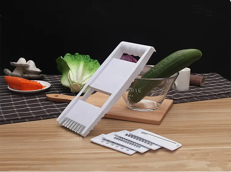 

4 in 1 Multifunction Plastic Vegetable Grater Slicing Mandoline Vegetable Cutter Adjustable Carrot Grater Onion Dicer KX 051