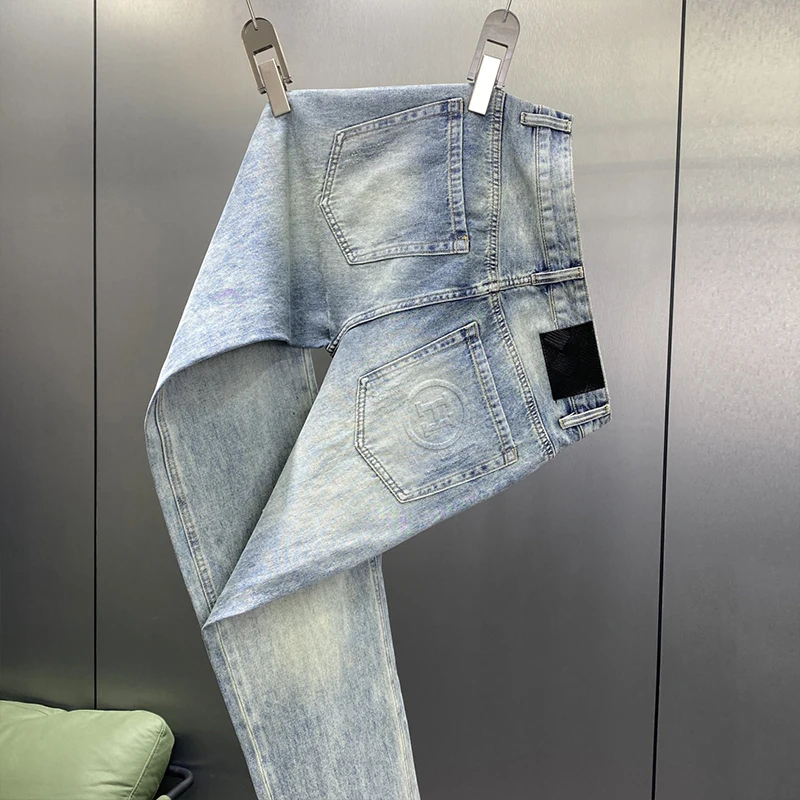 Wysokiej klasy jeansy dla mężczyzn modne lekkie luksusowe niebieskie w stylu retro elastyczne slim fit mała stopa modne letnie cienkie spodnie z nadrukiem