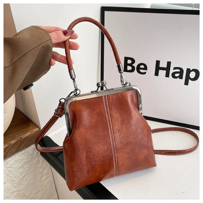 

Новая винтажная сумка-ракушка из мягкой кожи 2026 года, модная сумка с застежкой Kiss-Lock, универсальная сумка через плечо для женщин