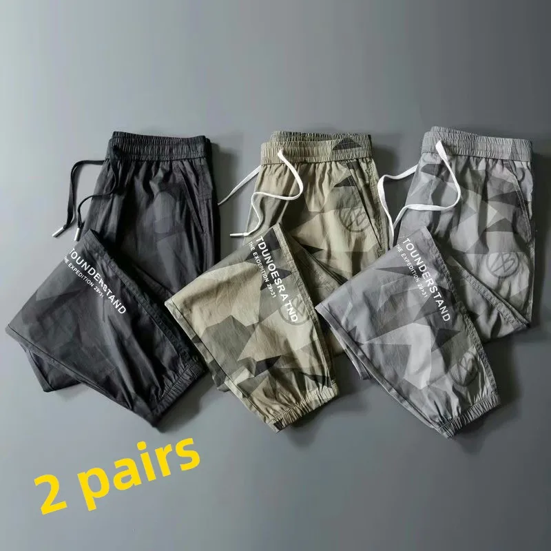 

Свободные мужские летние повседневные брюки из ледяного шелка, брюки-карго с низкой талией и камуфляжным принтом, удобные свободные молодежные модные брюки из тонкого материала