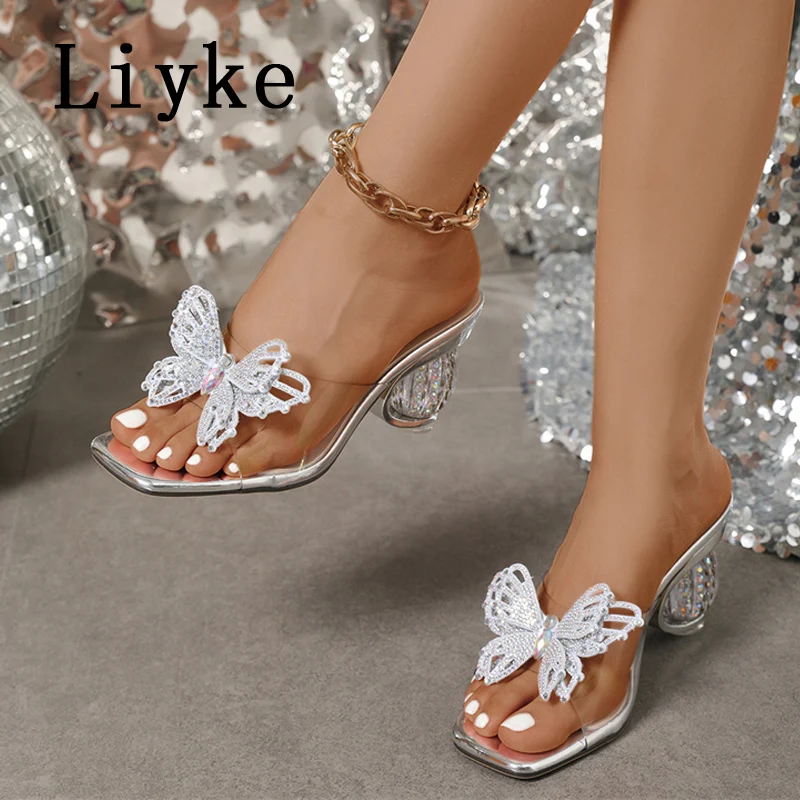 

Liyke Designer Crystal Rhinestone Butterfly Women Slippers Strange Fretwork Heels Transparent Sandals Female Summer Party Shoes