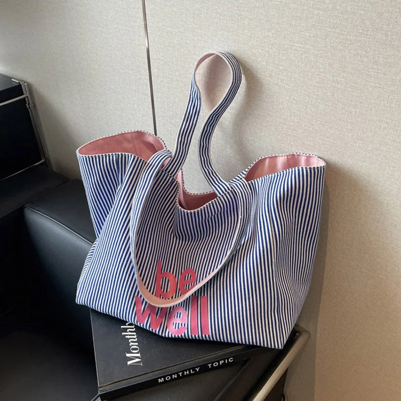 Bolso de hombro informal a rayas grandes para mujer, bolso de mano para ir al trabajo a la moda, bolso de lona de alta capacidad para jóvenes, 2025