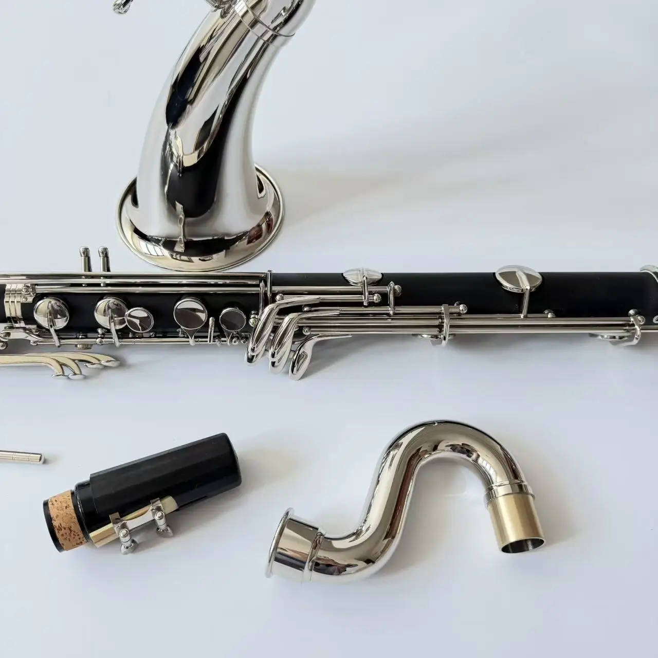 OEM Factory Wholesale Produce  Hard  Rubber Body Nickel Silver Plated Key Low E Bass Clarinet