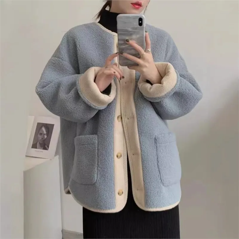 Lamb wool sweater jacket female new loose baseball suit top Korean version of the winter color blocking Faux Fur sweater NS5953