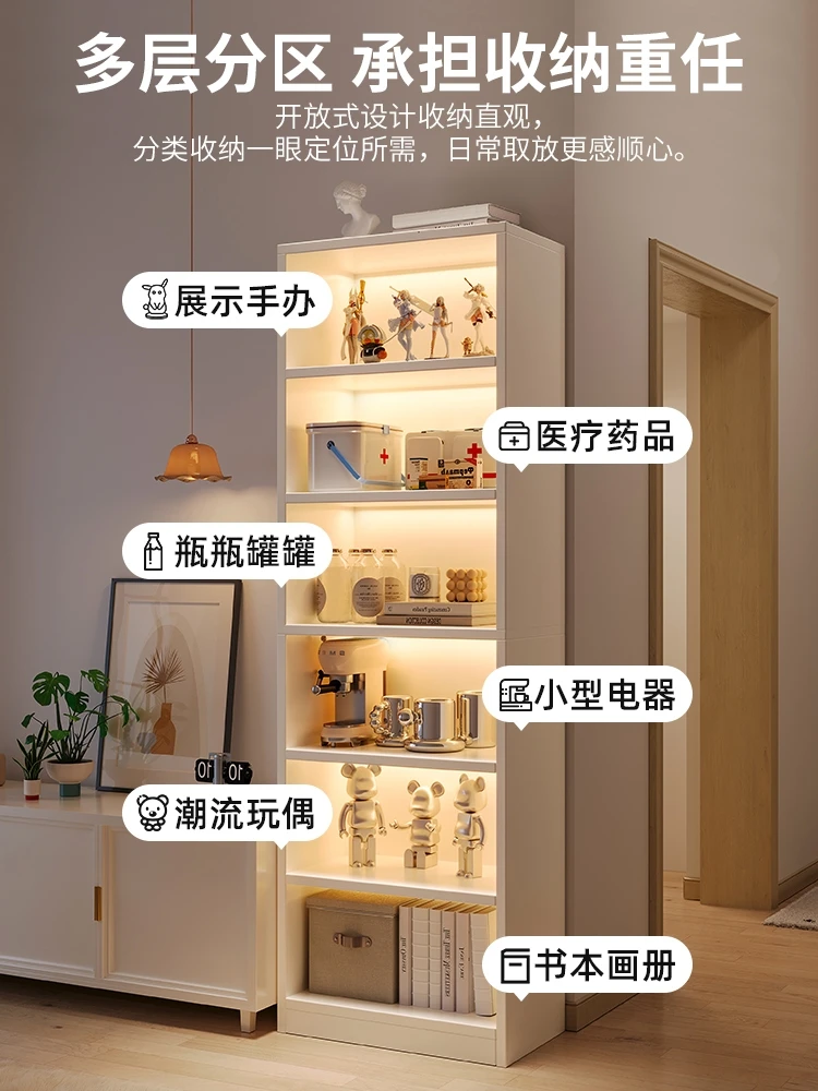 Simple toy storage multi-layer corner book cabinet in household living room with articles placed on the floor.