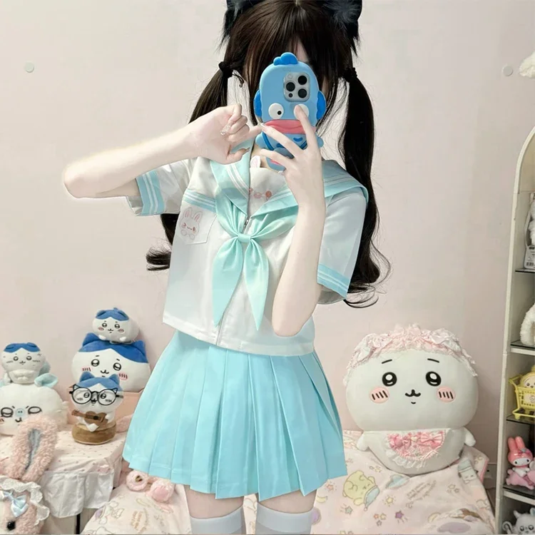 

Милая мультяшная вышивка с кроличьими ушками, темно-синяя рубашка с воротником, плиссированная юбка, комплект из двух предметов, милая женская униформа в японском консервативном стиле Jk