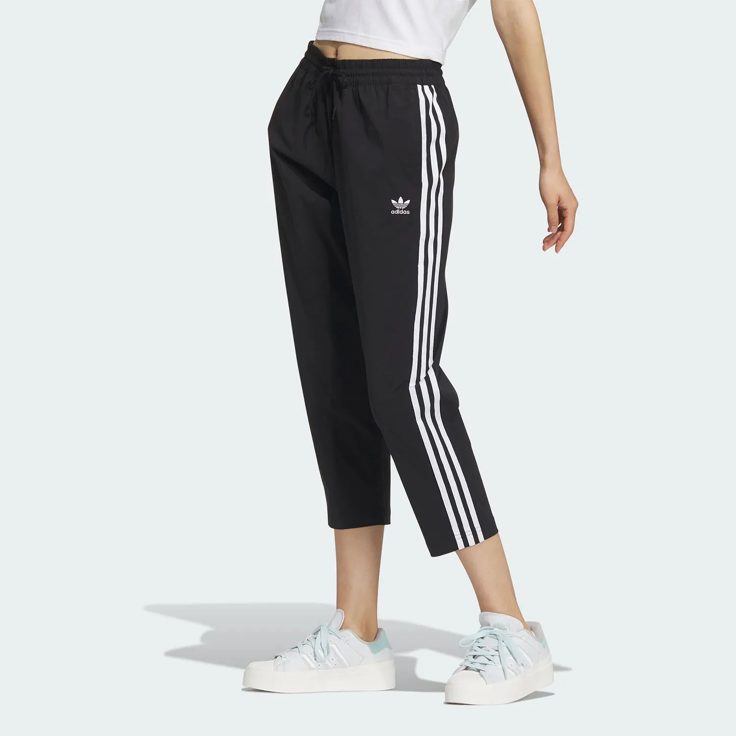 

Женские тканые спортивные брюки Adidas Originals Trefoil Seven-Eighths IK8679