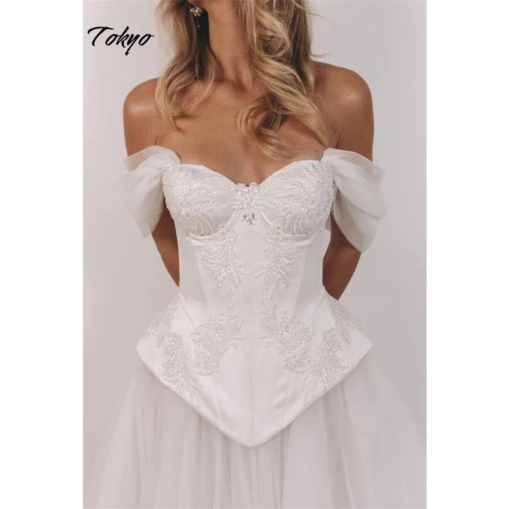 Tokyo Customized White A-Line Wedding Dresses Off Shoulder Sleeveless Bridal Gowns 2025 Back Lace-Up Court Train Wedding Gowns