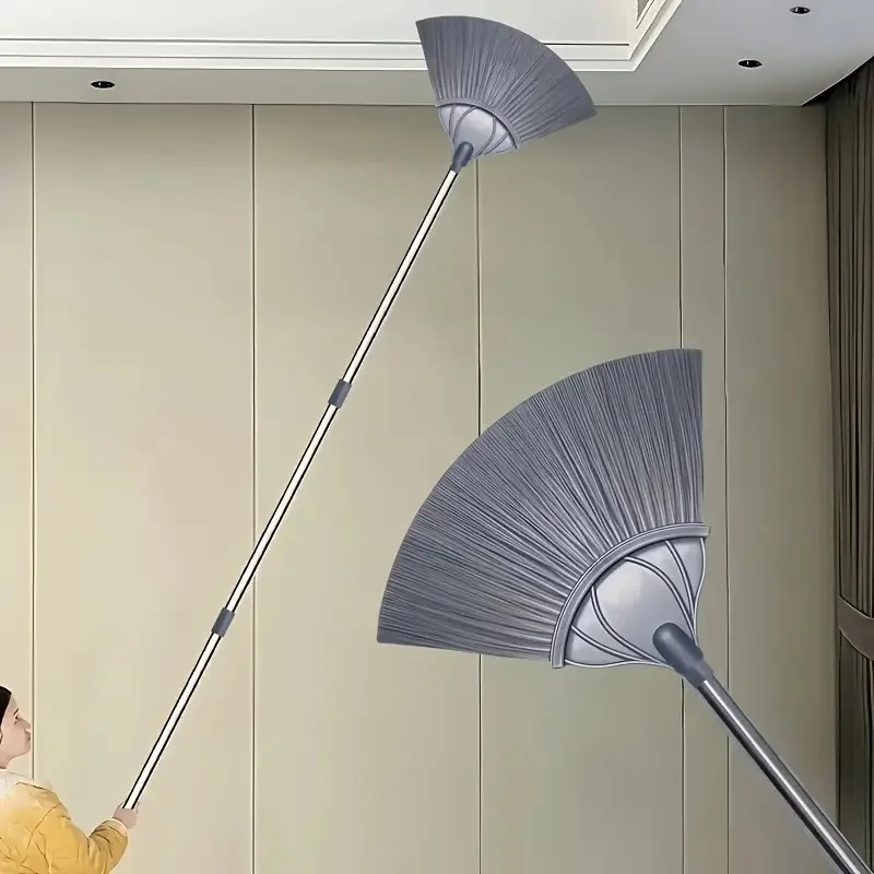 

A wall broom with an extendable handle, a spider web and dust broom, a reusable cleaning tool suitable for cleaning spider webs