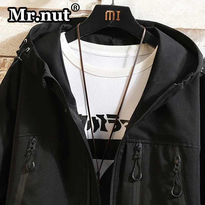 Mr. Nuss lose lässige Werkzeug jacke 8xl Herbst neue übergroße Kapuzen-Outdoor-Jacken Herren Wind jacke wasserdichter Camping mantel