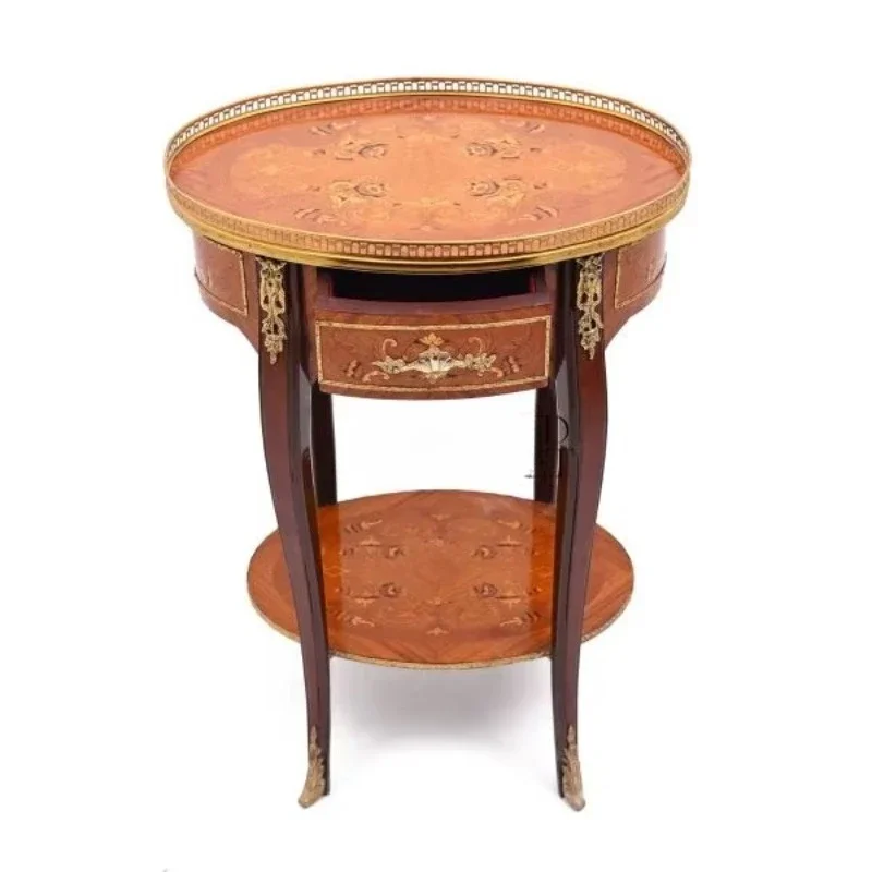 Luxury round wooden side table with lower shelving, gold-plated brass detailing
