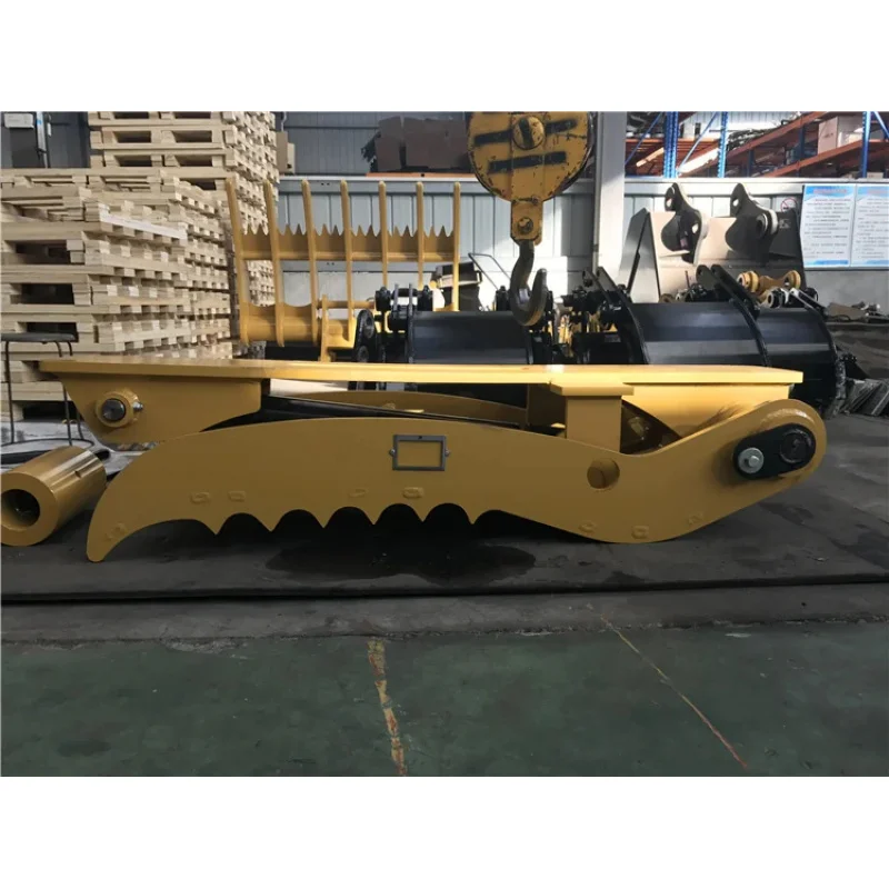 Backhoe Attachment Hydraulic And Thumb Are Used For Rock Grapping