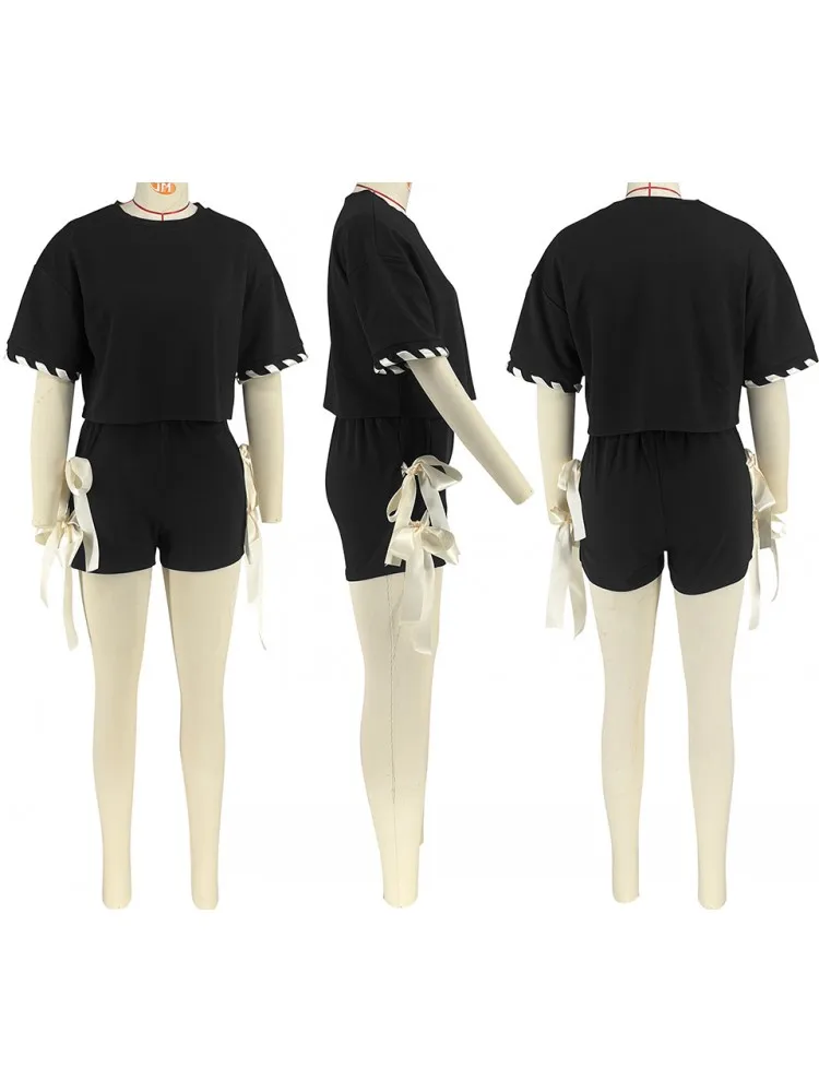 Set da donna da 2 pezzi 2025 Nuovo arrivo Estate Autunno abbinato Set da due pezzi Top a manica corta e pantaloncini Abiti Abiti Abbigliamento