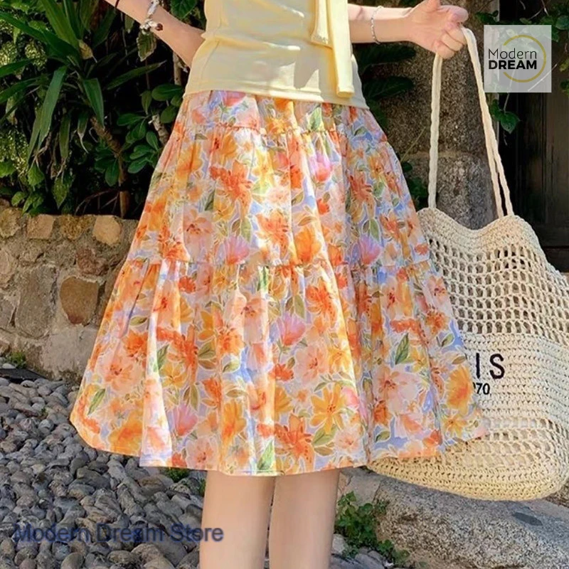 Summer orange flowers in the skirt floral big swing skirt female French new cute sweet playful wear A version of the skirt.