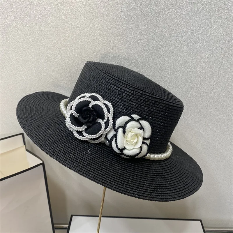 Spring and summer women\'s small fragrant wind pearl flat top hat flower fashion straw hat elegant Hepburn wind sun visor hat