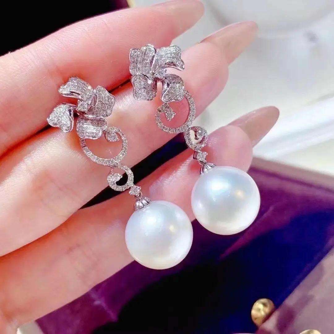 

Elegant Pair of South Sea10-11mm Round White Pearl Earring 925s