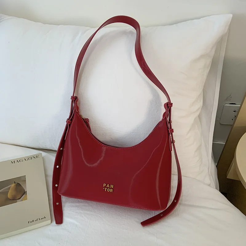 

2025's Trending Crescent Dumpling Bag - Minimalist Niche-Design Shoulder Sling