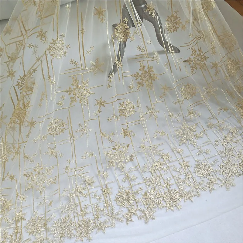 

Golden snowflake embroidery lace fabric Wedding Dress Tulle Skirt Material fabrics for patchwork kumas telas por metros