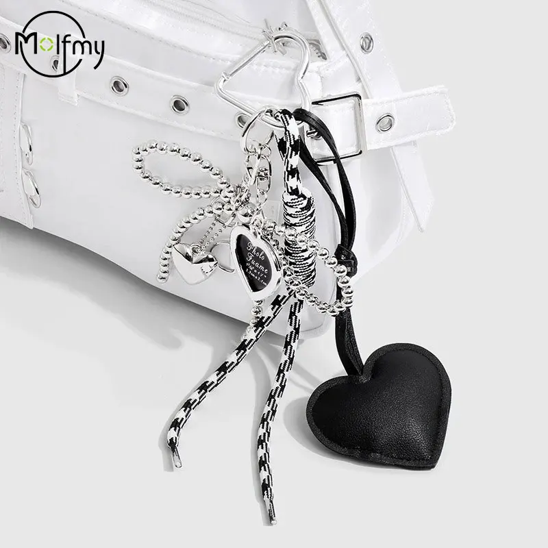 Colgante de bolso con lazo de cuentas de plata, colgante de corazón de amor con borla de lujo, llavero con lazo creativo hecho a mano, accesorios colgantes brillantes bonitos