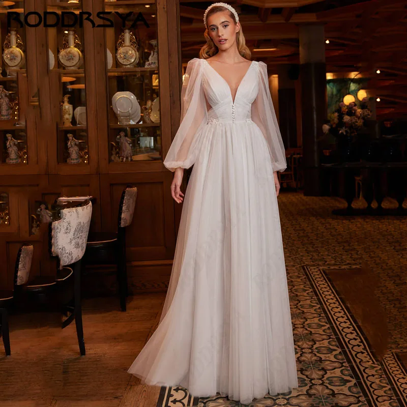 RODDRSYA abito da sposa a maniche lunghe con scollo a v profondo a sbuffo elegante pizzo a-line Robe De Soirée Sexy Backless Sweep Train festa nuziale  abito da sposa a maniche lunghe con scollo a v profondo a sbuffo e