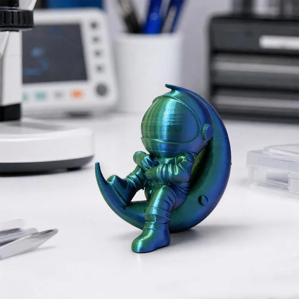 3D Printed Moon Astronaut Figurine, Sitting on Crescent Moon Spaceman Statue, Astronaut Desktop Decoration for Home Office Books