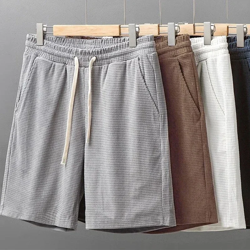 

Поп вафельные шорты мужские летние новые корейские повседневные свободные брюки длиной до колена модные универсальные однотонные баскетбольные спортивные брюки