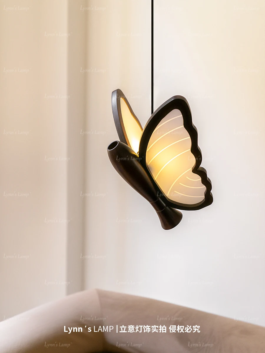 Walnut colored butterfly pendant light decorated with floral arrangements creating an atmosphere Bedroom headboard antique