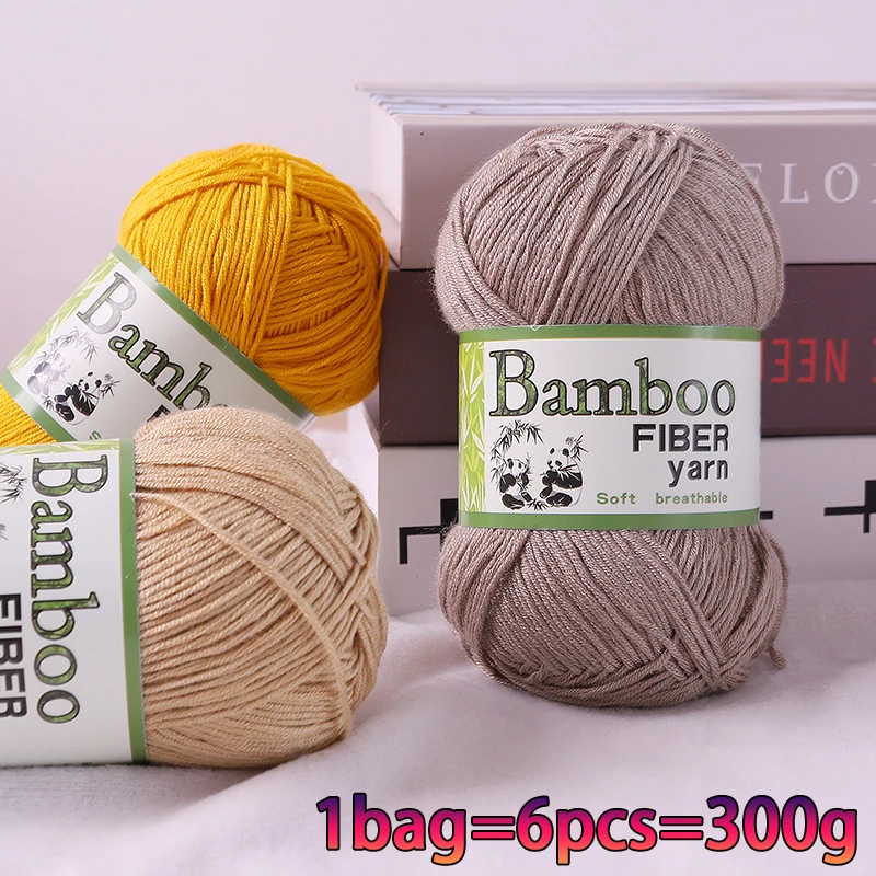 300g de fio de algodão de bambu. Este fio de algodão de bambu é principalmente feito de mistura de fibra de bambu e fibra de algodão. o Macio e Suave. o lenço, suéter e uma manta pequena pode trazer experiência extremamente confortável em algodão de bambu