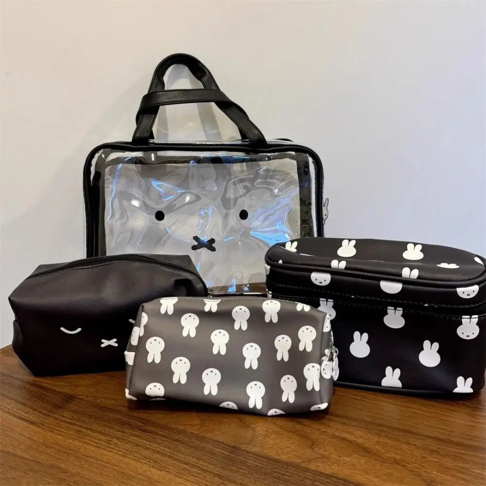 

Miffy Cartoon Cute large-capacity portable makeup bag four-piece set Travel hand-held storage bag Toiletries Bag Sorting bag