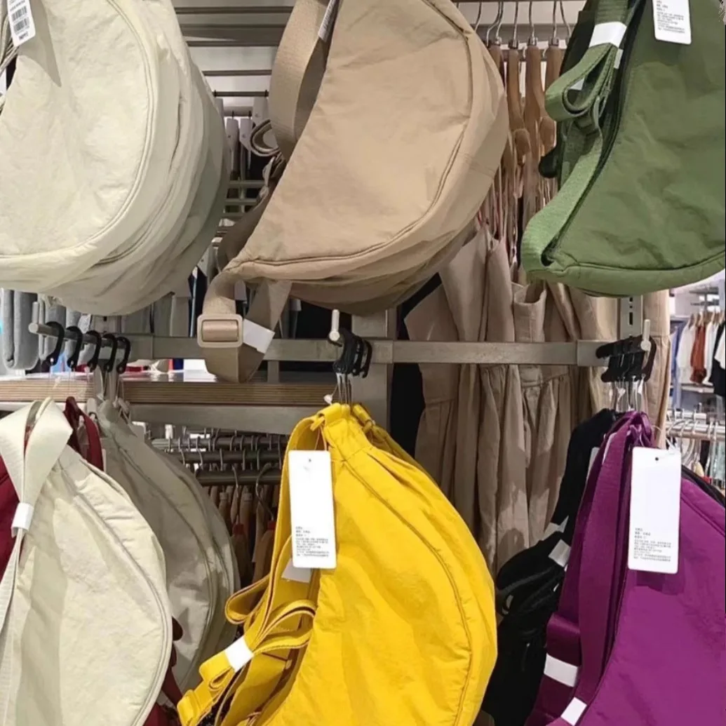 bolsa-transversal-leve-e-ajustavel-em-formato-de-lua-crescente-para-homens-e-mulheres-–-moderna-e-casual