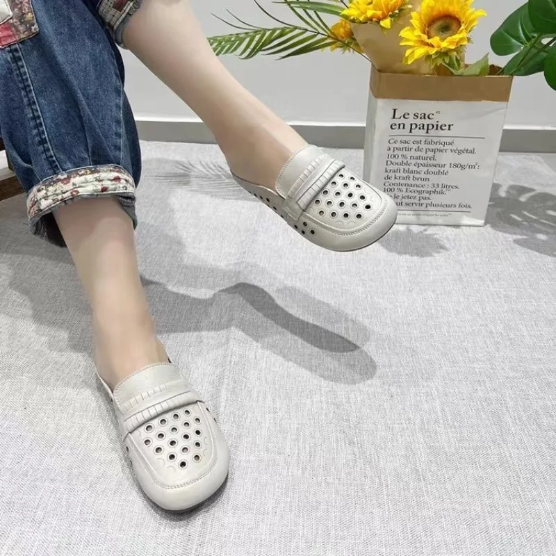 

Women's Mules Loafers Round Toe Flat Perforated Hollow Out Upper Slip on Shoes Fringed Penny Band Casual Walking Footwear 2026