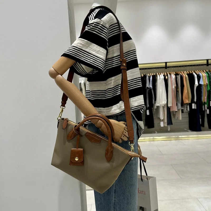 

Modern Neutral Sle Nylon Oil Wax Leather Small Tote Bag Dumpling oulder Crossbody Bag Women's Handbag Koudi Brand