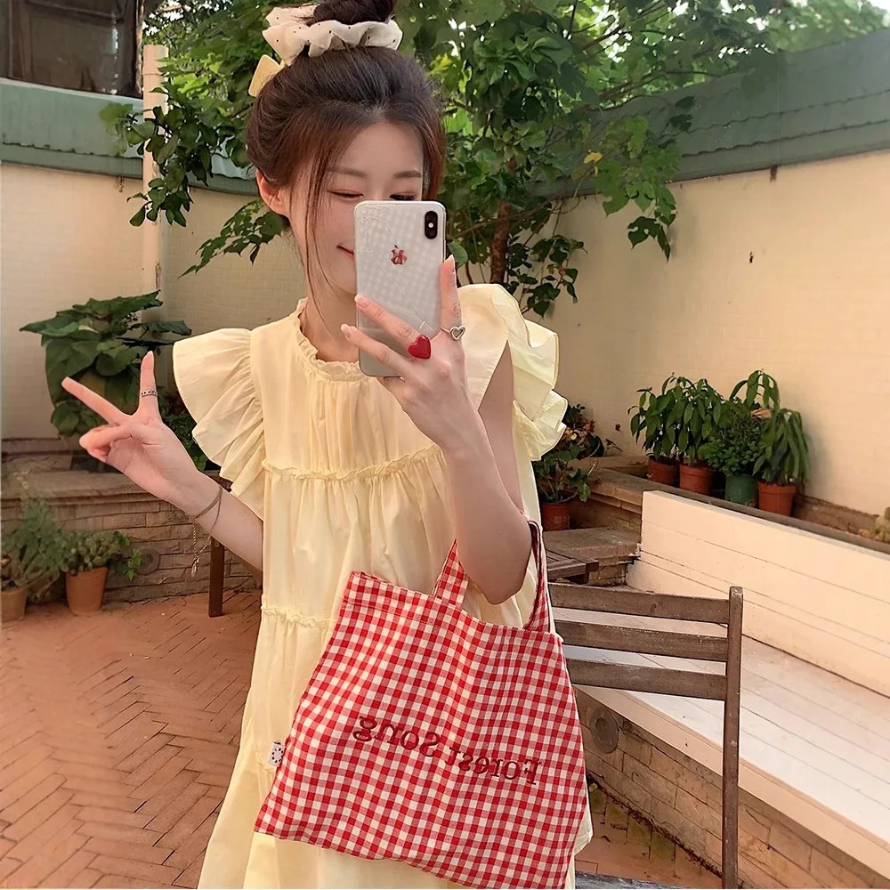 Sweet and gentle pink flying sleeve dress for women in summer 2025 new small and loose A-line short skirt