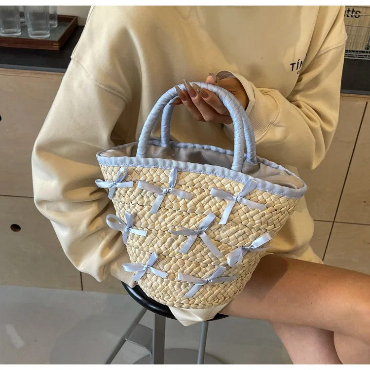 

2024 spring and summer new fashion simple seaside vacation leisure hand carry woven bucket bag