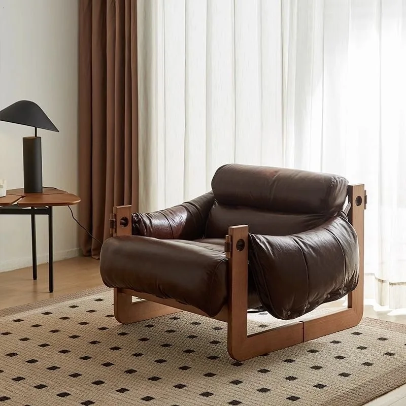 

Nordic designer single sofa chair light luxury art leather leisure chair home living room armchair