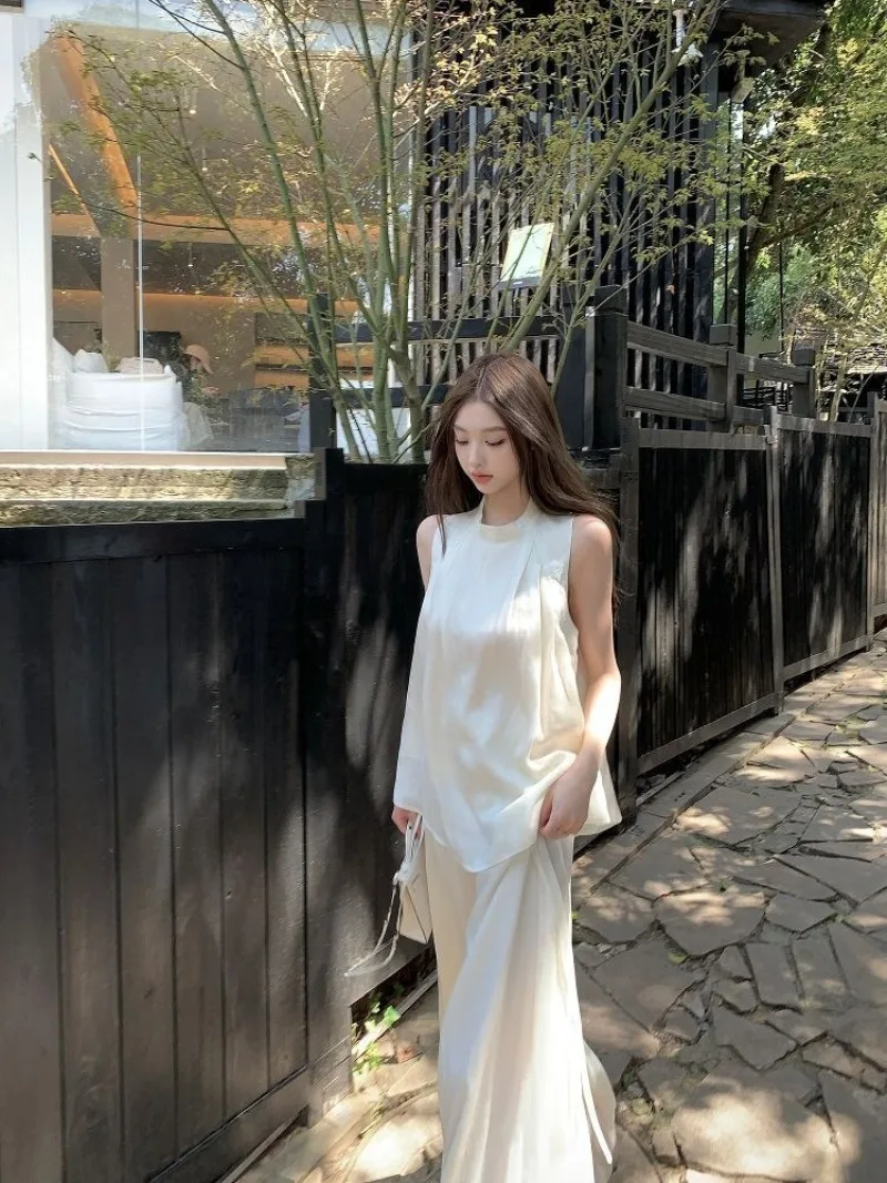 

Модный летний комплект в корейском стиле 2026: женский топ без рукавов и широкие брюки, спортивный повседневный костюм-двойка премиум-класса